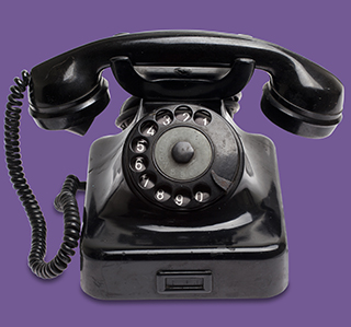 Old black phone suggests contacting us will lead to old-fashioned customer service